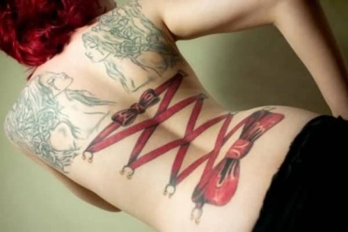 Red Ribbon Corset Tattoo On Girl Back Body