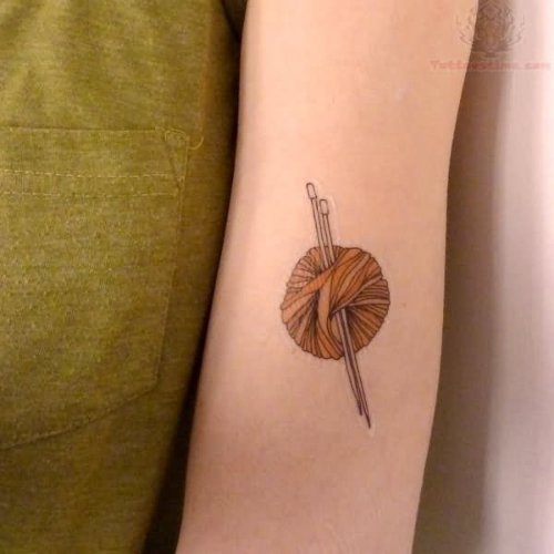 Color Yarn Tattoo On Left Arm