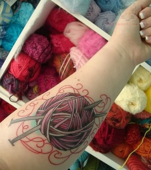 Yarn Tattoo On Left Arm