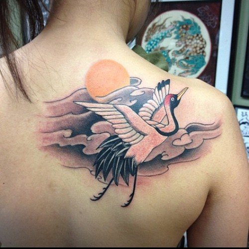 Sun And Crane Tattoo On Right Back Shoulder