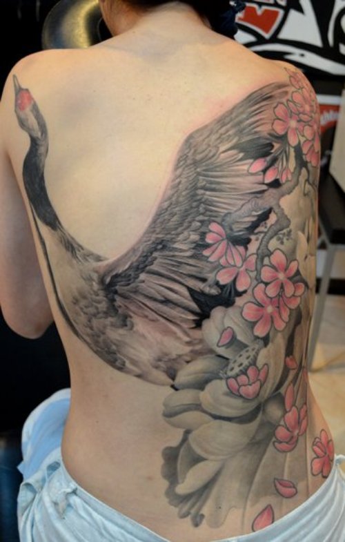 Flowers And Crane Tattoo On Back