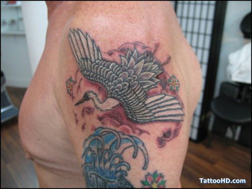 Grey Ink flying Crane Tattoo On Man Left Shoulder
