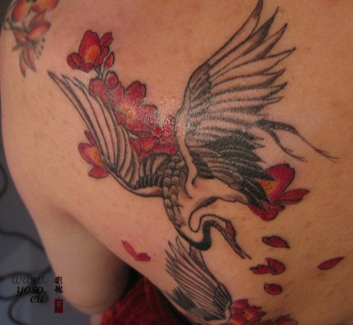 Red Flowers And Crane Tattoo On Left Back Shoulder