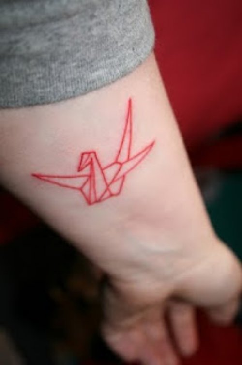 Red Ink Crane Tattoo On Left Forearm