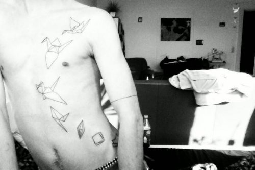 Flying Paper Cranes Tattoos On Guy Chest