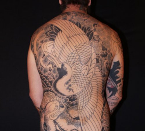 Grey Ink Crane Tattoo On Back For Men