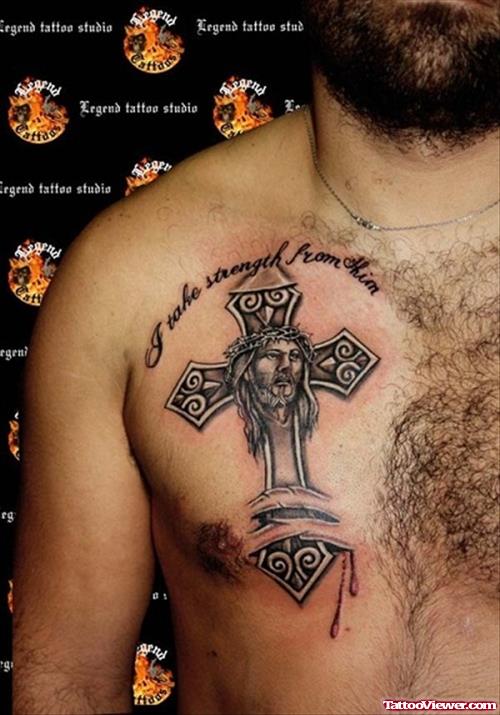 Grey Ink Cross With Jesus Head Tattoo On Man Chest