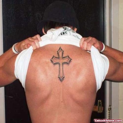 Grey Ink Cross Tattoo On Upperback