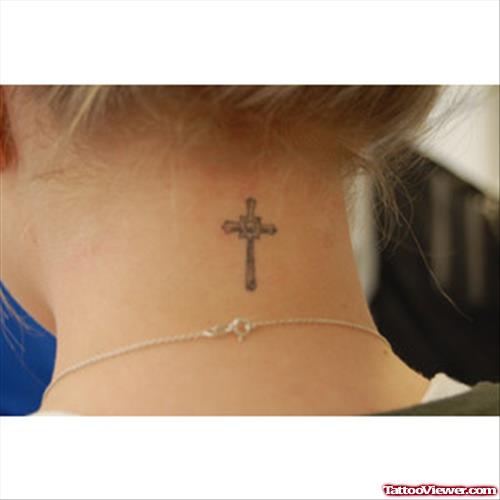 Girl With Cross Tattoo On Nape