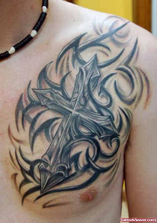 Awesome Grey Ink Cross And Tribal Tattoo On Left Chest