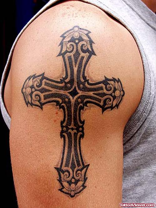 Amazing Black Ink Tribal Cross Tattoo On Right SHoulder
