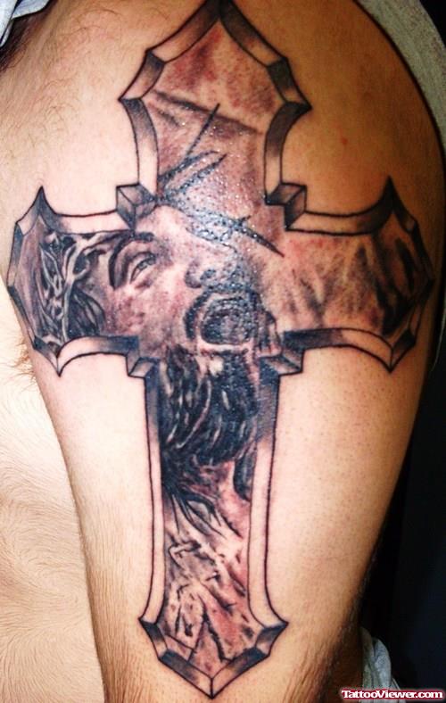 Grey Ink Cross With Jesus Head Tattoo On Left Half Sleeve