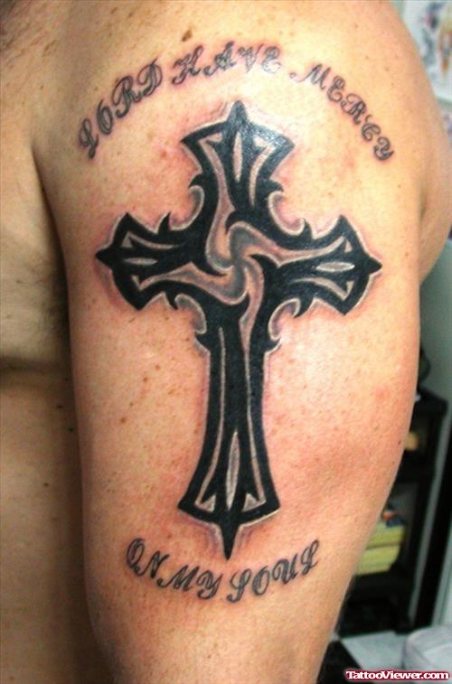Amazing Black Ink Tribal Cross Tattoo On Left Half Sleeve