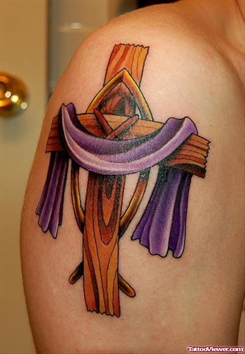 Wooden Cross Tattoo On Man Right Shoulder