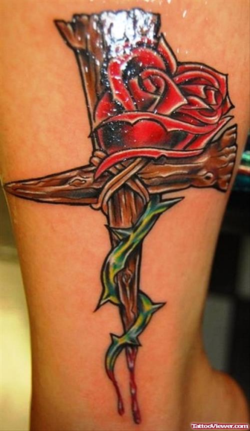 Red Rose And Cross Tattoo On Leg