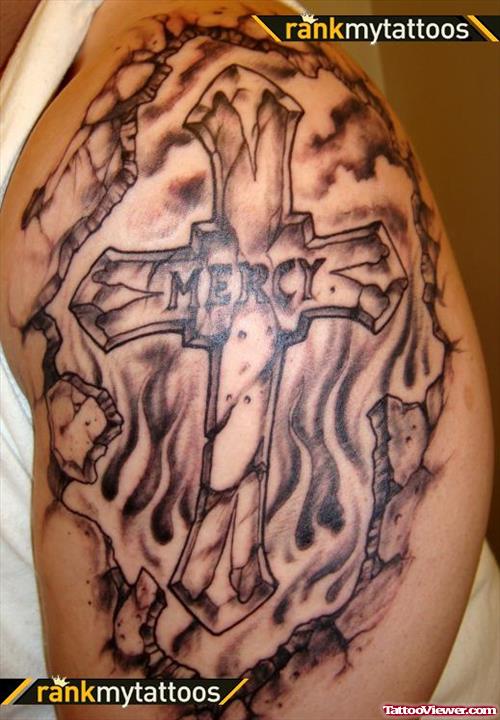 Grey Ink Flaming Cross Tattoo On Left Shoulder