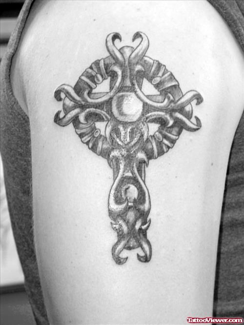 Amazing Grey Ink Cross Tattoo On Right Shoulder