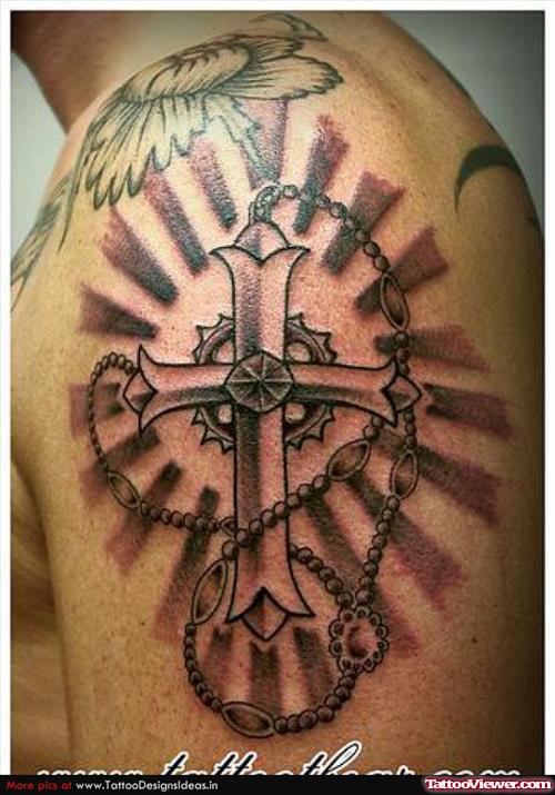 Grey Ink Cross Rosary Tattoo On Left Shoulder
