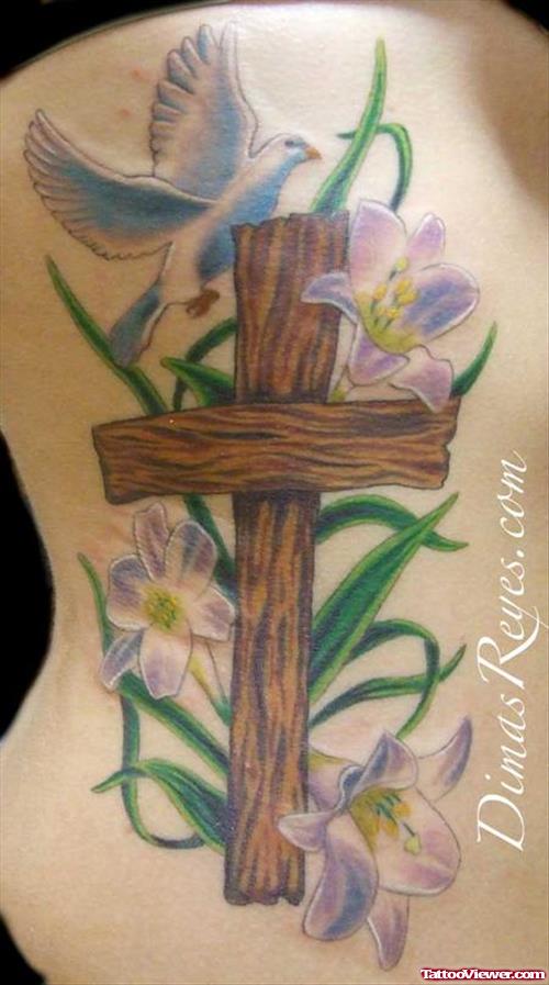 Flying Dove And Cross With Flowers Tattoo On Side Rib
