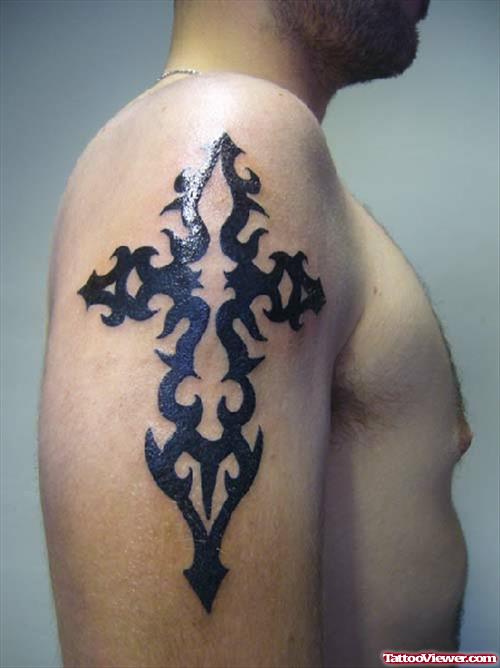Black Ink Tribal Cross Tattoo On Right SHoulder