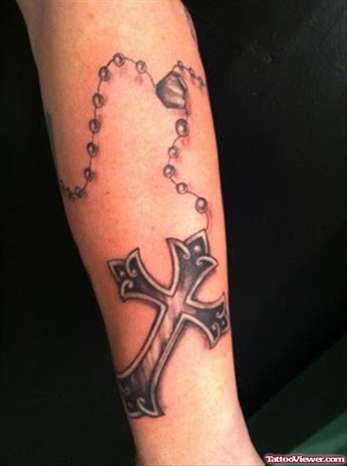 Amazing Grey Ink Rosary Cross Tattoo On Arm
