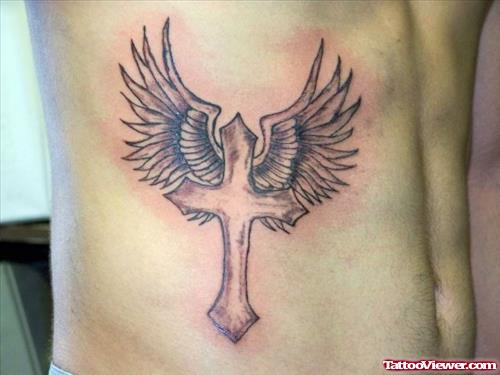 Grey Ink Winged Cross Tattoo On Side Rib