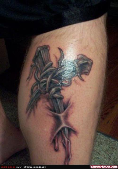 Ripped Cross Tattoo On Right Leg