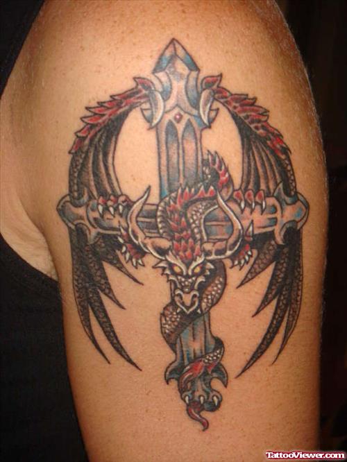 Winged Cross And Dragon Tattoo On Left Shoulder