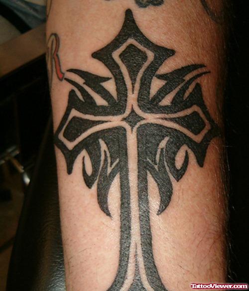 Amazing Black Ink Tribal Cross Tattoo