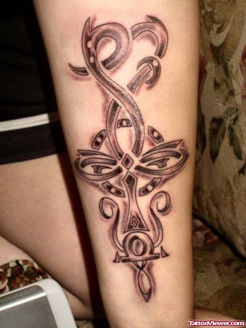 Amazing Tribal Cross Tattoo On Arm