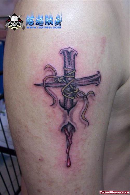 Ripped Cross Tattoo On Right Half Sleeve
