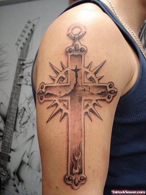 Grey Ink Cross Tattoo On Man Right Half Sleeve