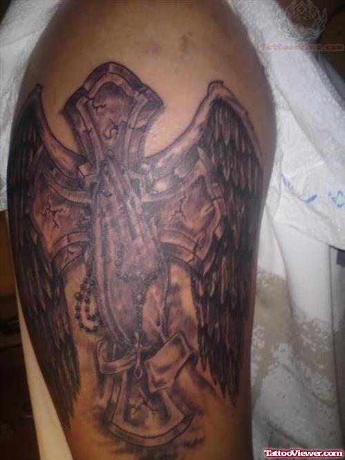 Winged Cross And Praying Hands Tattoo