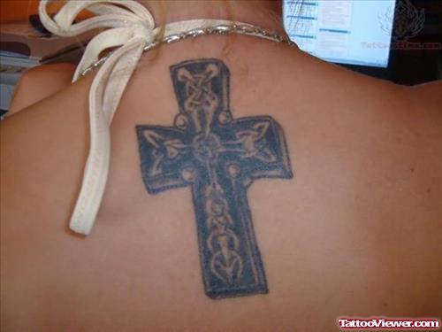 Cross Tattoo On Upperback