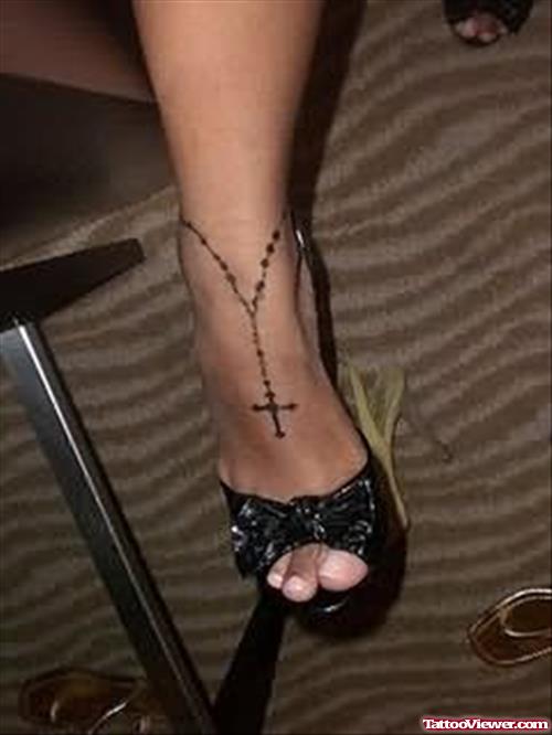 Tiny Cross Tattoo On Ankle