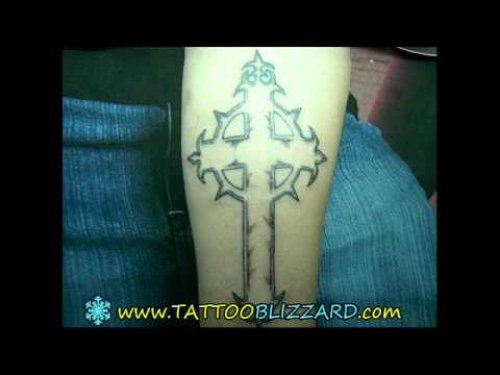 Outline Cross Tattoo On Left Arm