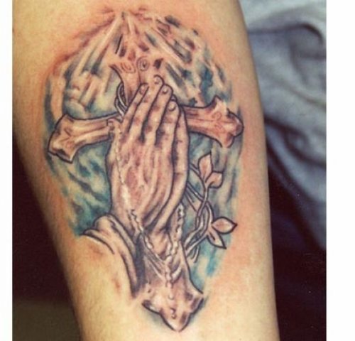 Cross And Praying Hands Tattoo On Arm