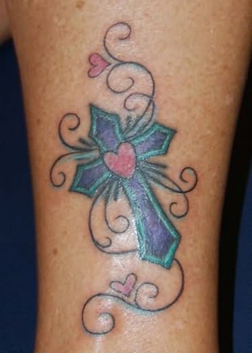 Blue Ink Cross Tattoo On Leg