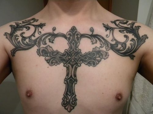Grey Ink Cross Tattoo On Man Chest