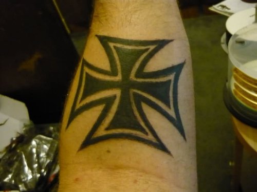 Black Ink Cross Tattoo On Forearm