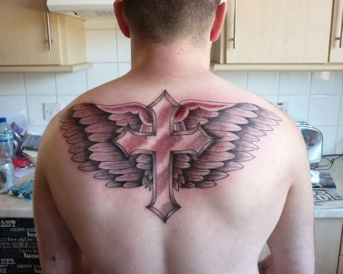 Classic Winged Cross Tattoo On Upperback