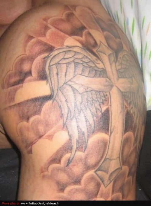 Winged Cross Tattoo On Left Shoulder