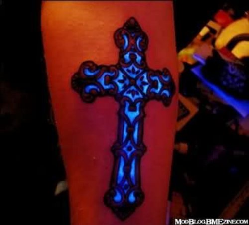 Uv Light Cross Tattoo On Arm