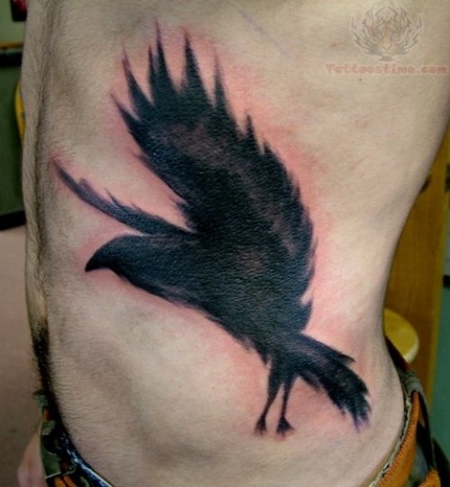 Flying Crow Tattoo On Rib