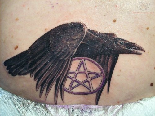 Raven And Star Tattoo On Lowerback