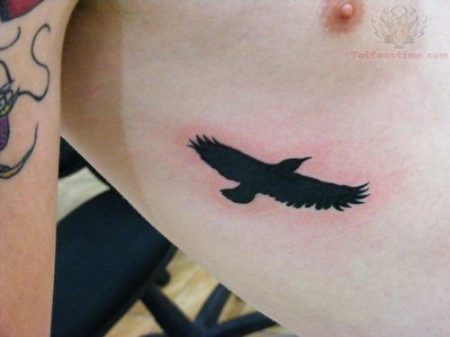 Black  Crow Tattoo On Rib