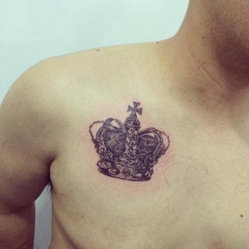 Crown Tattoo On Man Chest