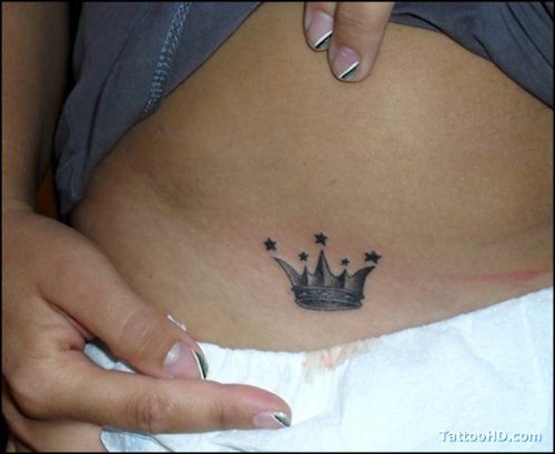 Grey Ink Crown Tattoo On Hip