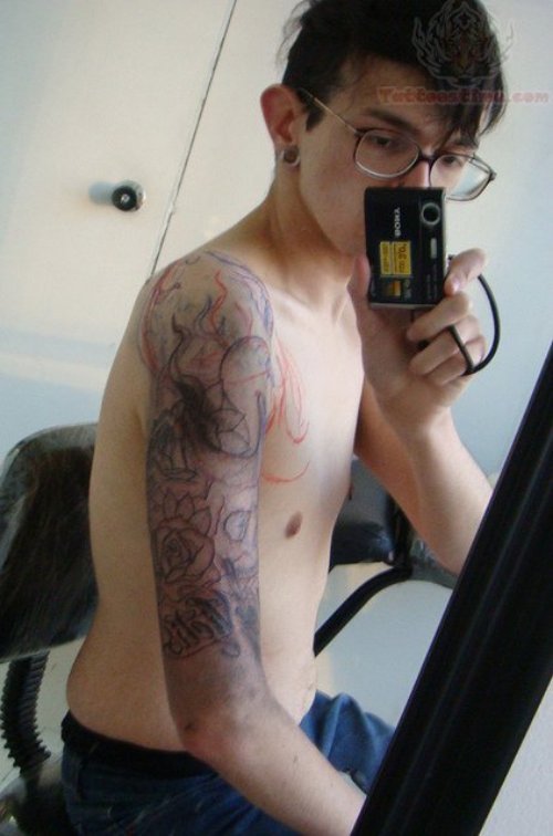 Guy With Cthulhu Tattoo On Half Sleeve