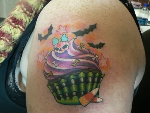 Halloween Cupcake Tattoo On Left Shoulder